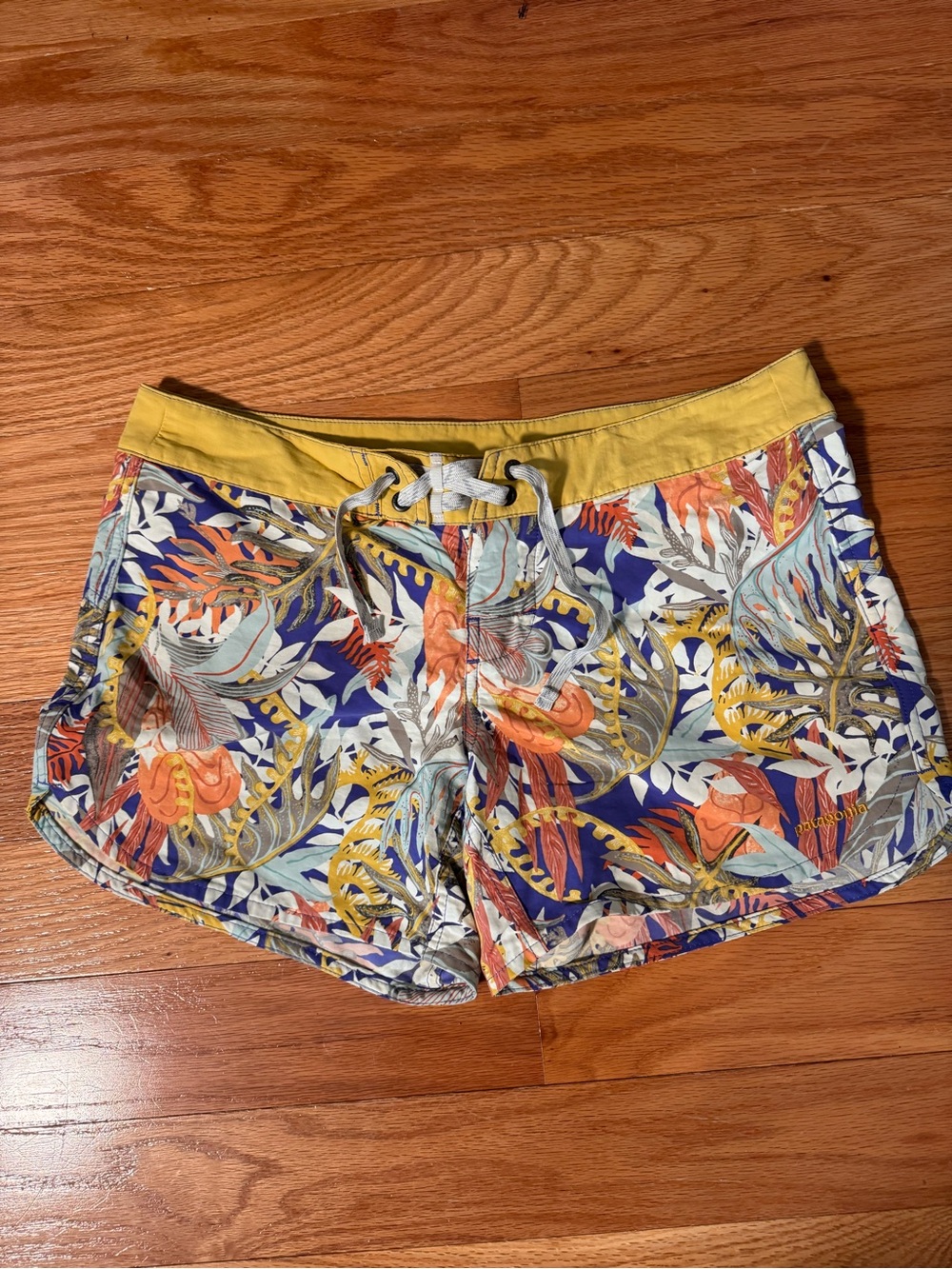 Patagonia multi colored yellow swim board shorts size 6
